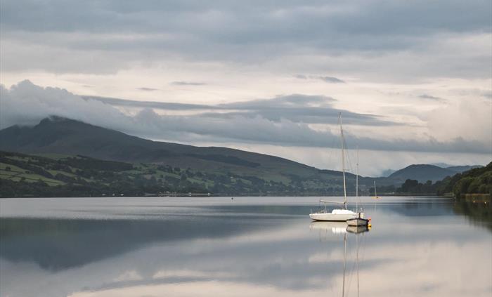 Wild swimming in the clear waters of Llyn Tegid